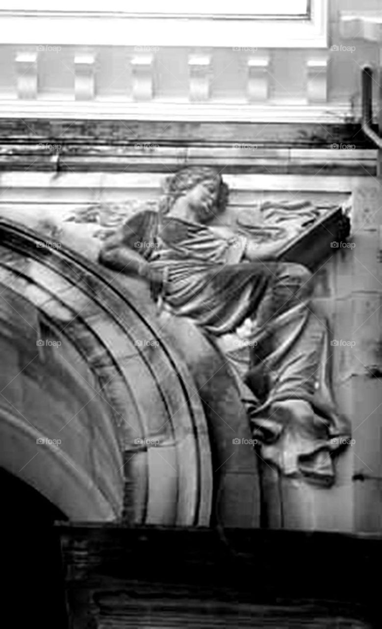 Sculpture. This is a sculpture on one of the public buildings in Savanah.