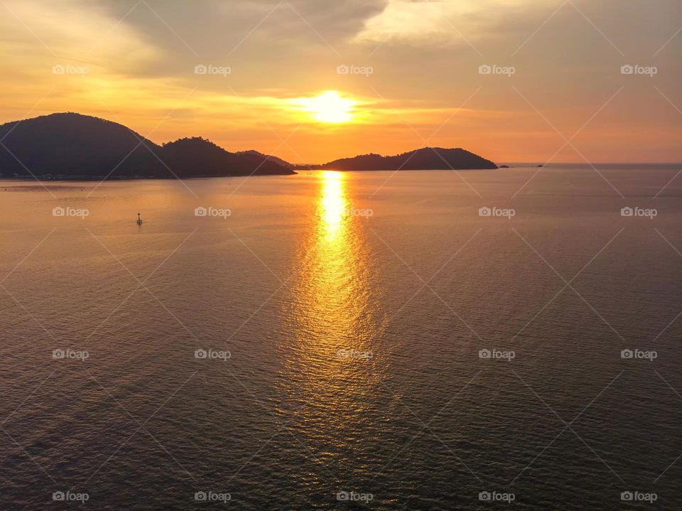 Aerial view of sunset over the sea