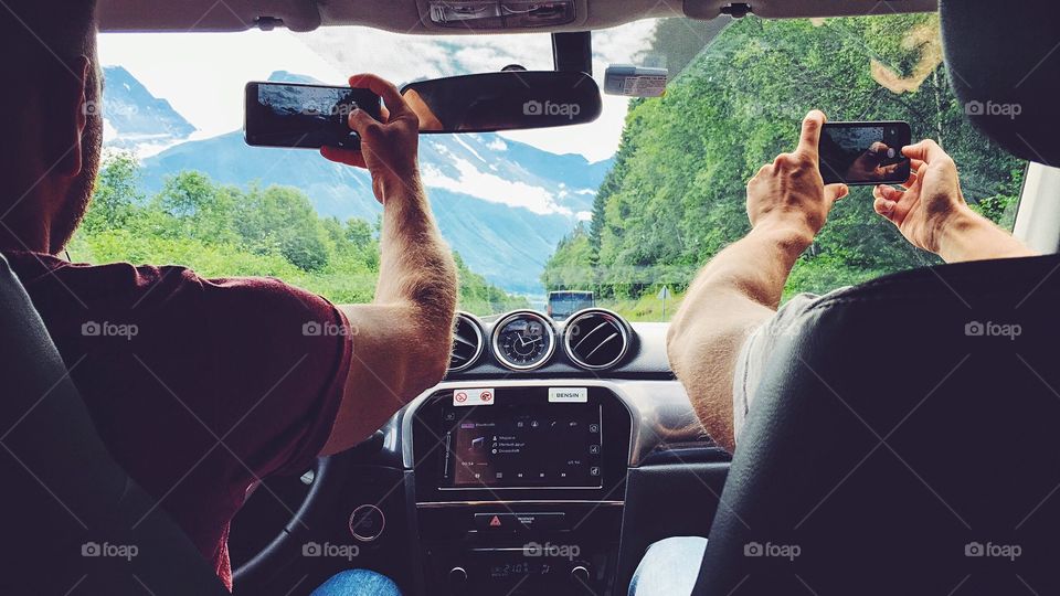 Taking shots in the car while enjoying trip around Norway. 