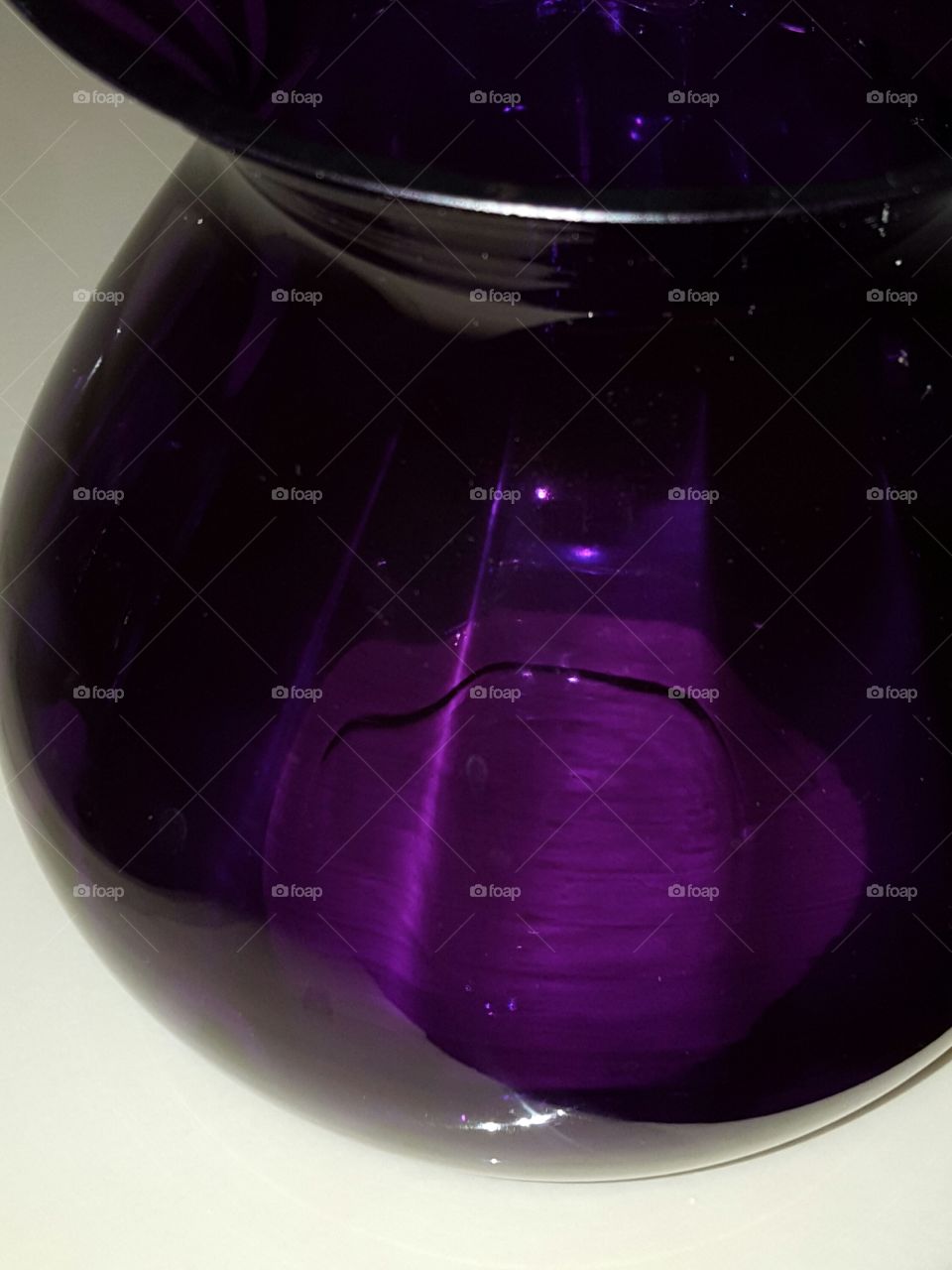 purple glass vase