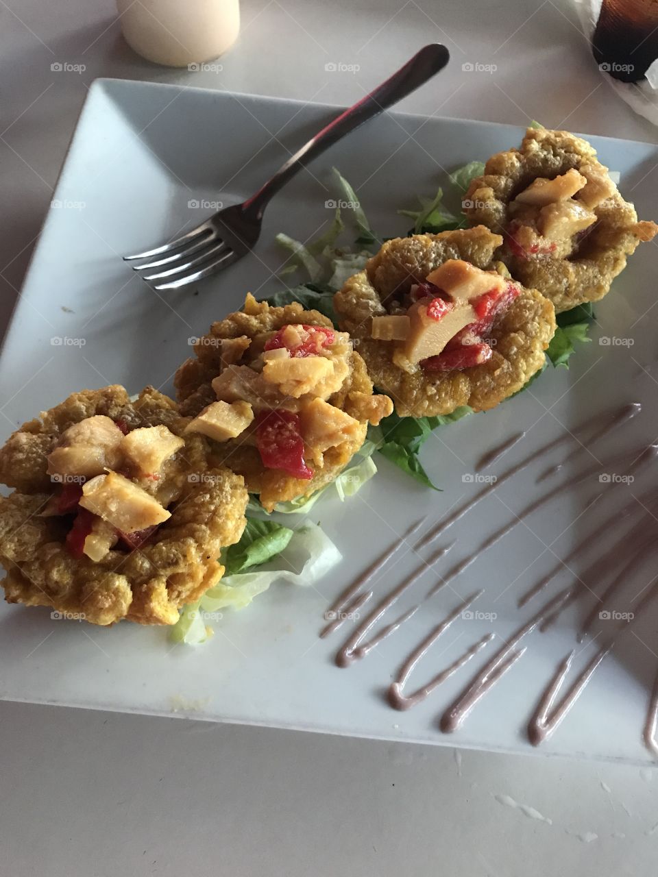 A Puerto Rican dish of plantain cups stuffed with fresh fish and peppers