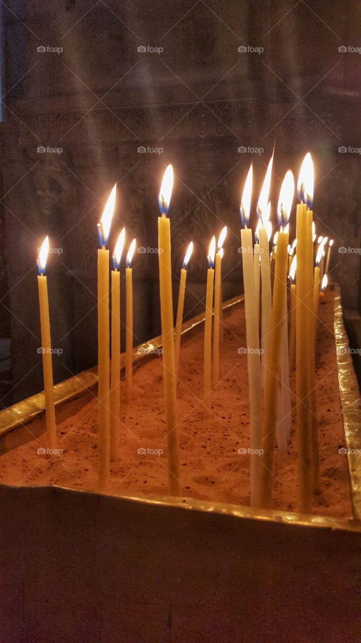 candles. candles onfire in temple