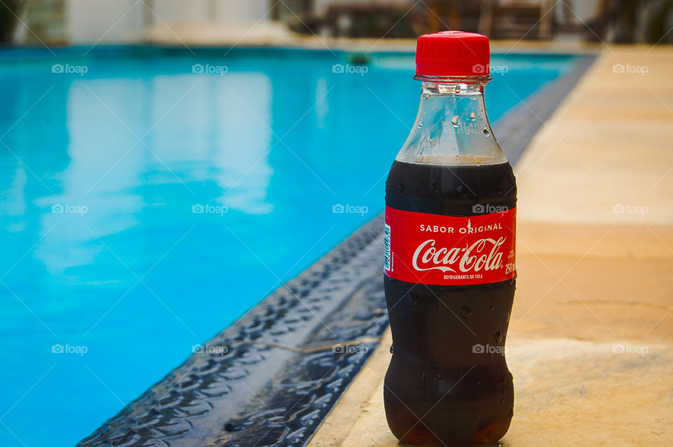 Coca Cola near swimming pool 