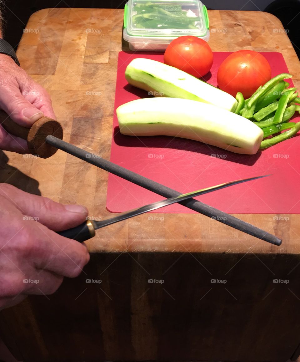 We need a sharp knife to slice our fixings small enough to eat with a spoon. Everything in the salad is tough enough that we like it small so the taste of everything mixes together with the sea salt (just enough) to make it juicy!