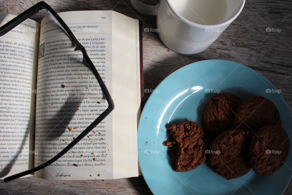 reading morning eating cookie and drinking milk