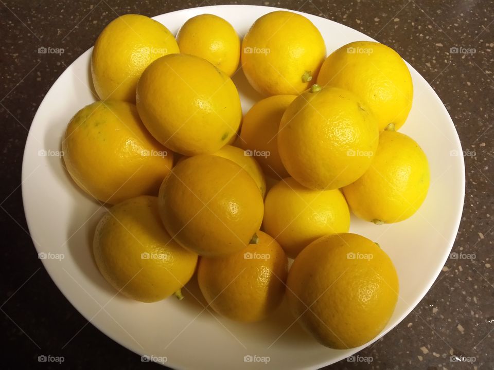 Bowl of Meyer lemons.