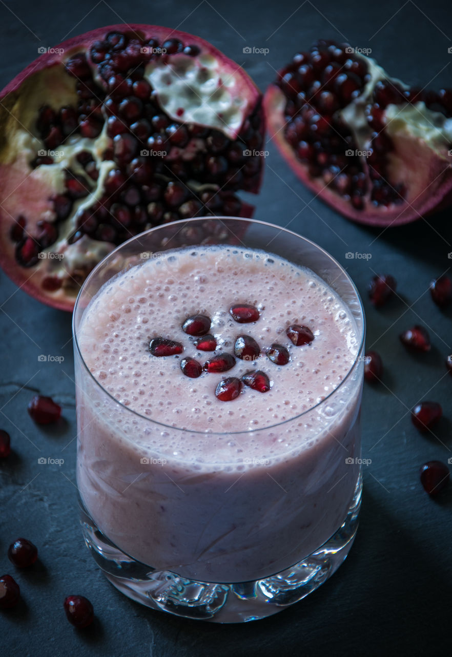 Yogurt, banana and pomegranate smoothie