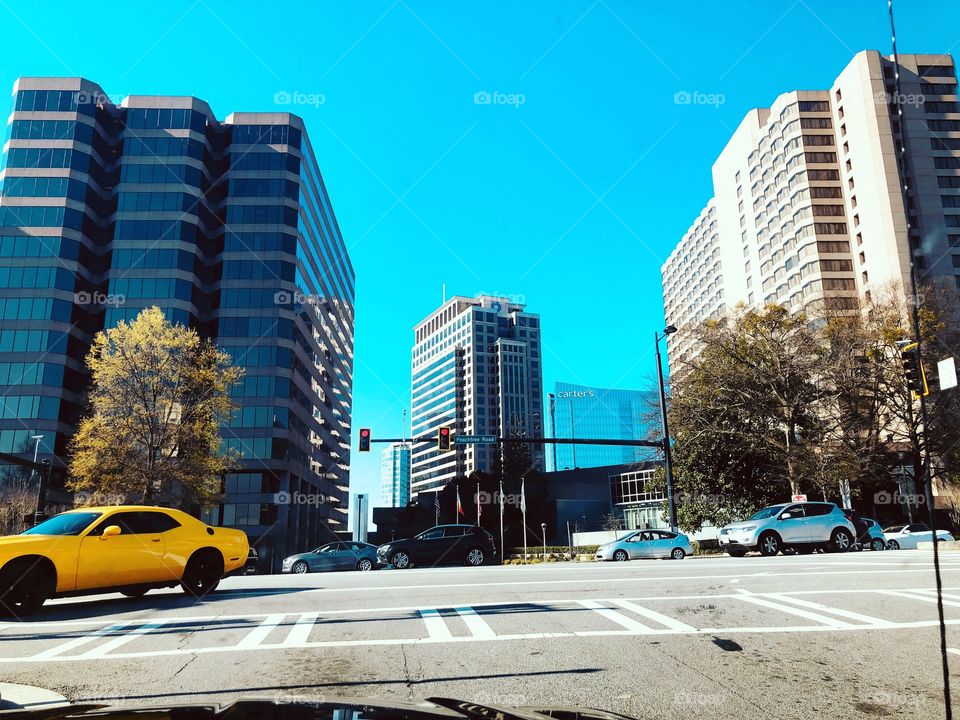 Beautiful Atlanta buildings shooting high into the blue and bright sky  