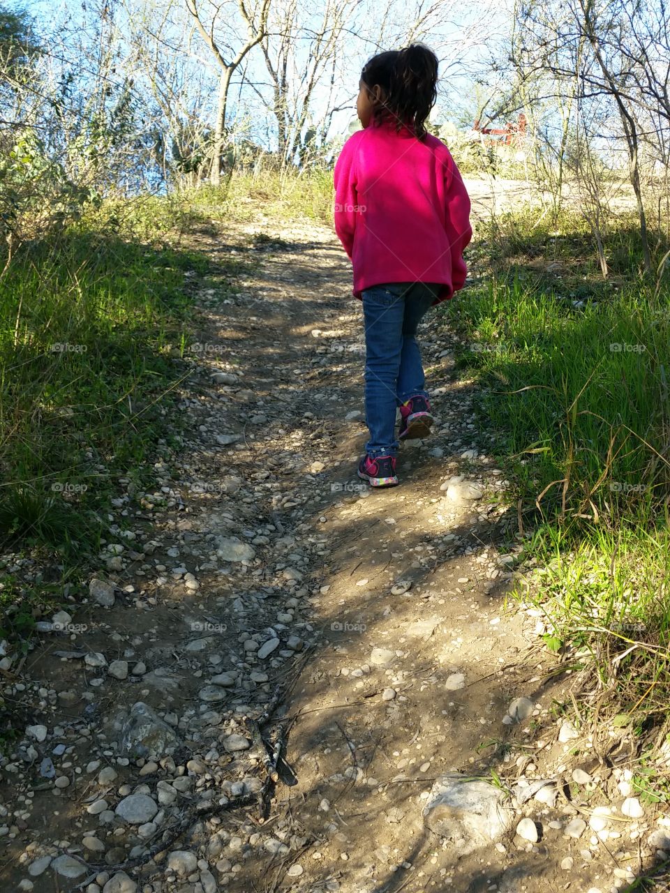outdoor adventure. This is a picture of daughter when we went to a park. We were walking through one of the trails.