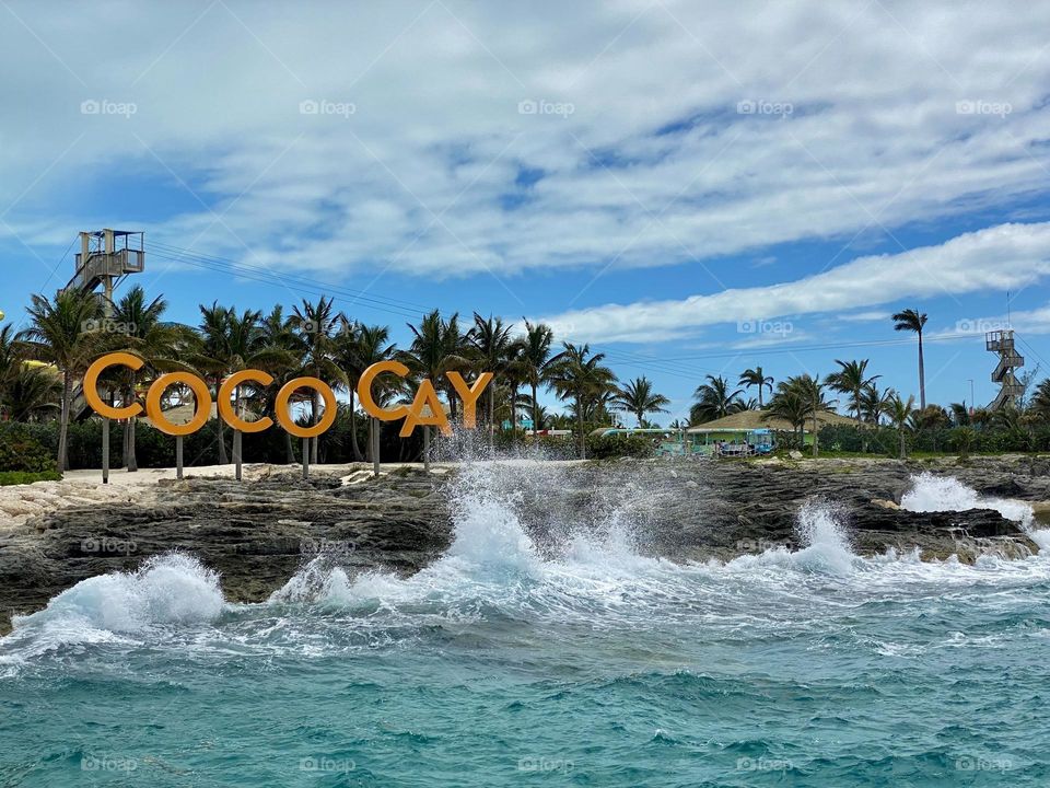 Waves crashing ashore at Coco Cay in the Bahamas