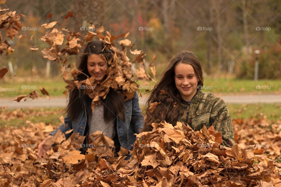 Natural Leaf Scarf. During the fun fight between my sisters, a caught a cool look with the leaves surrounding one of them like a scarf.