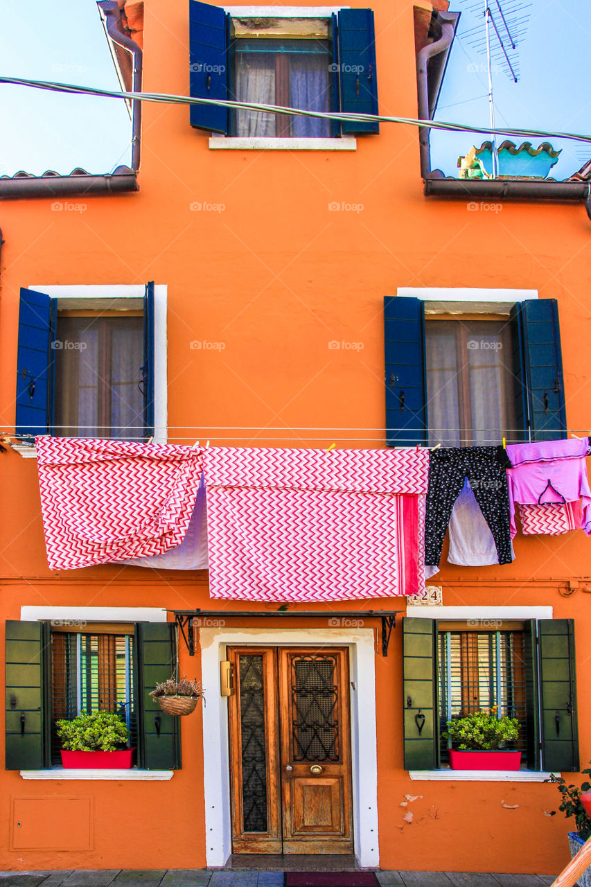 Orange building in Venice city.