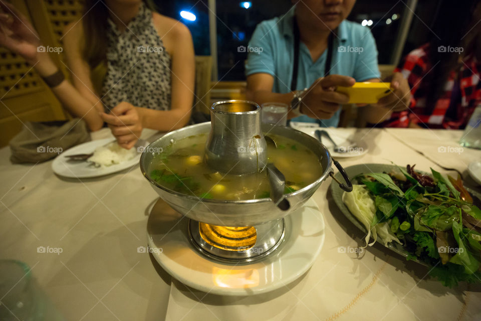 Tom yam kung famous thai food on the table