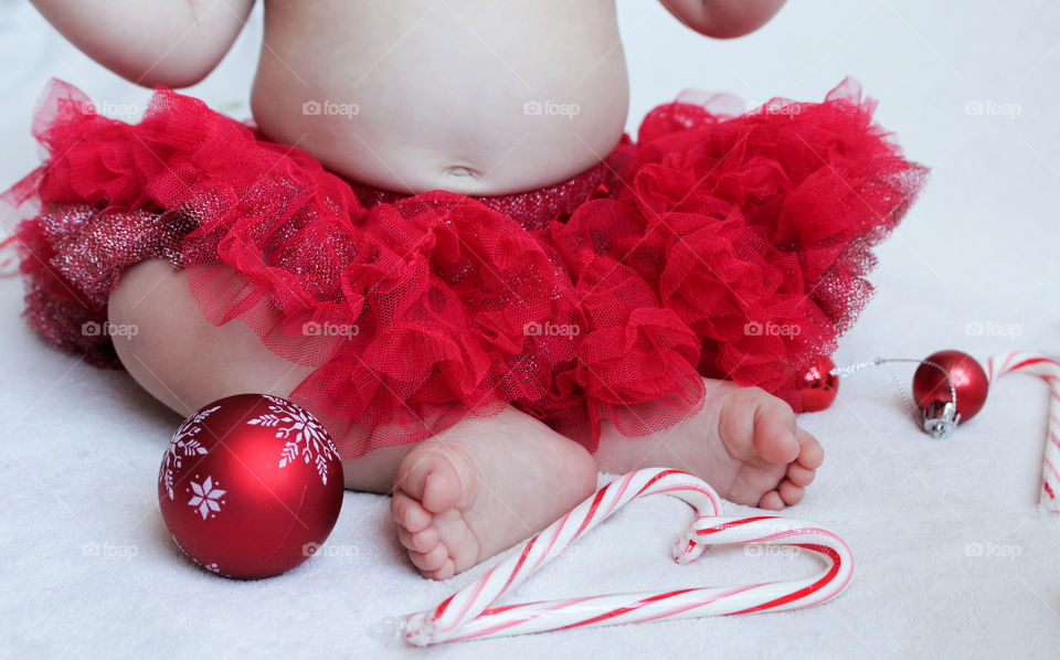 baby girl wearing red tutu