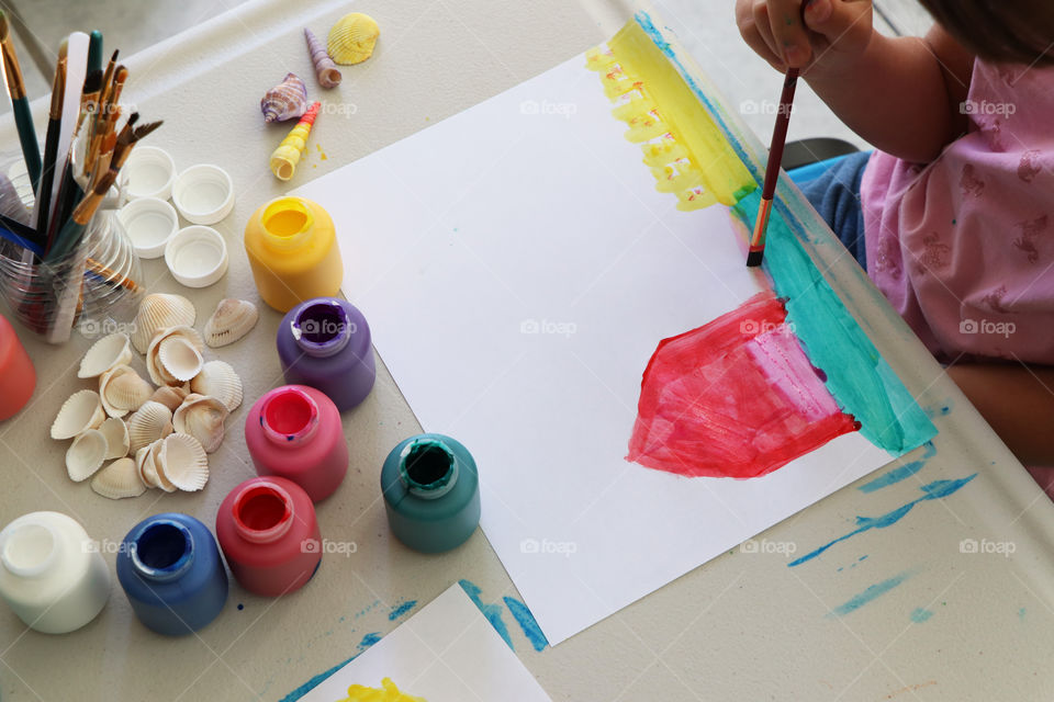 Children creating paintings