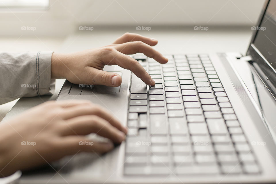 child with laptop