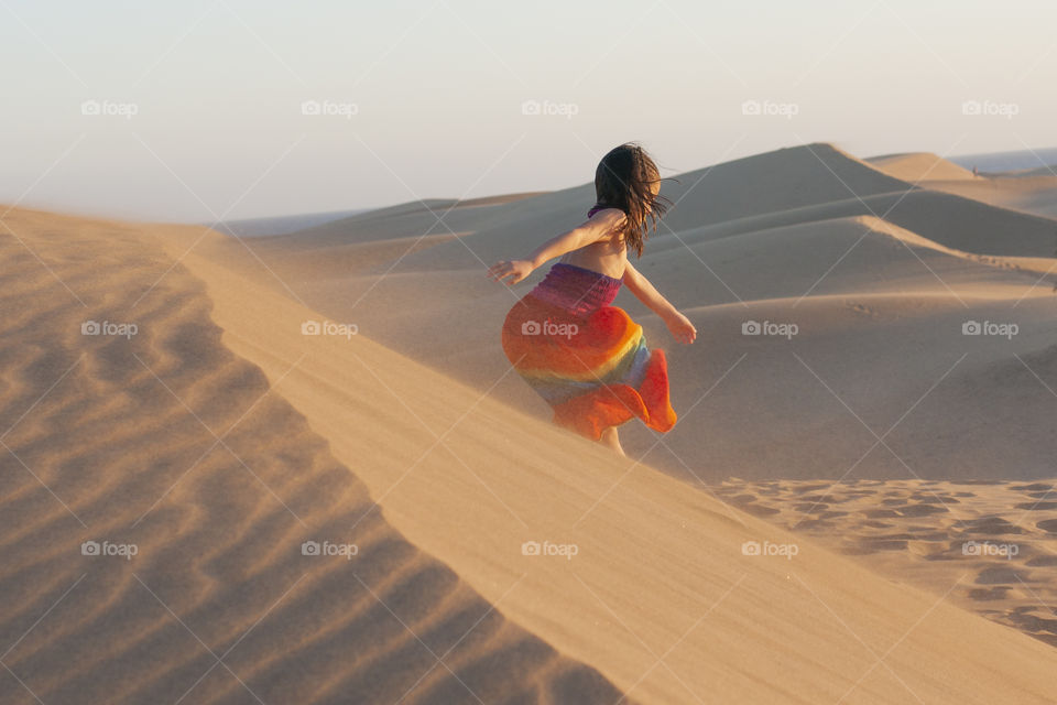 Summertime. Wind in the sand dunes