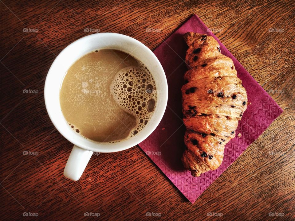Breakfast) . Coffee and choco croissant 