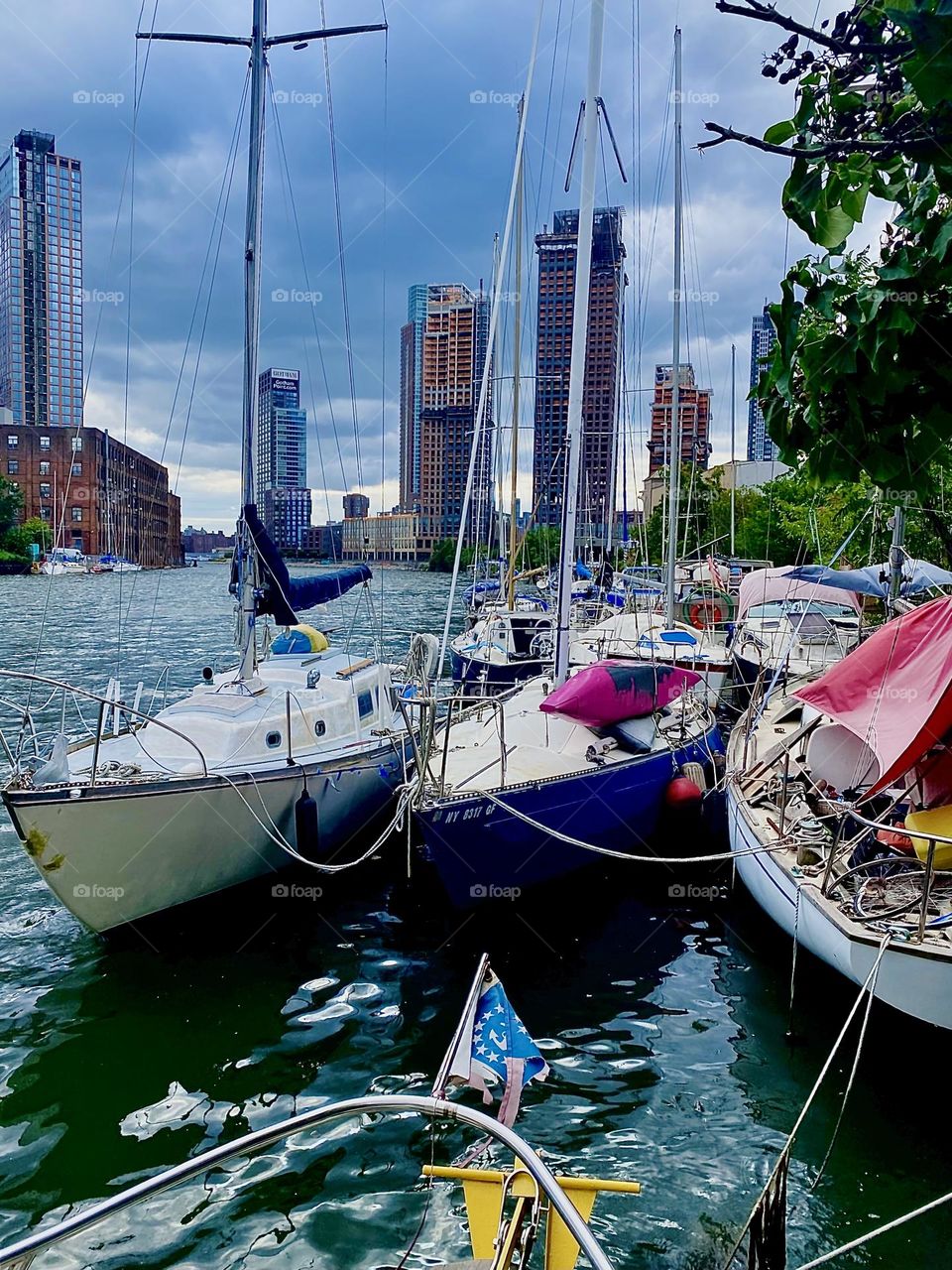 This ultra-cool image from the surface of the “East River” at “Newtown Creek” by the “Pulaski Bridge” in LIC, Queens was taken from aboard “Salvation”, the “28 ft 1969 Luhrs”. cabin cruiser that is my salvation and my home. 2023. Hypnotic Productions