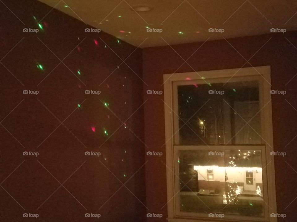 Christmas lights through a window