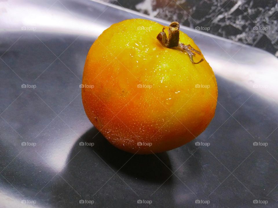 Fresh tomato fruit on the table