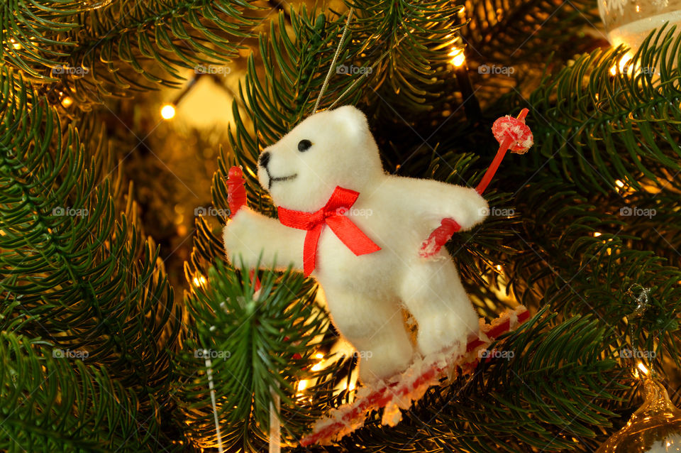 Christmas decoration in the shape of a bear that is skiing