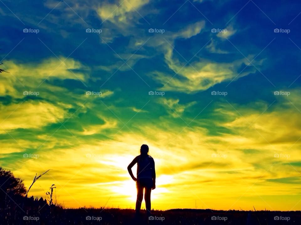 A marvelous Minnesota sunset over a local farmers field. 