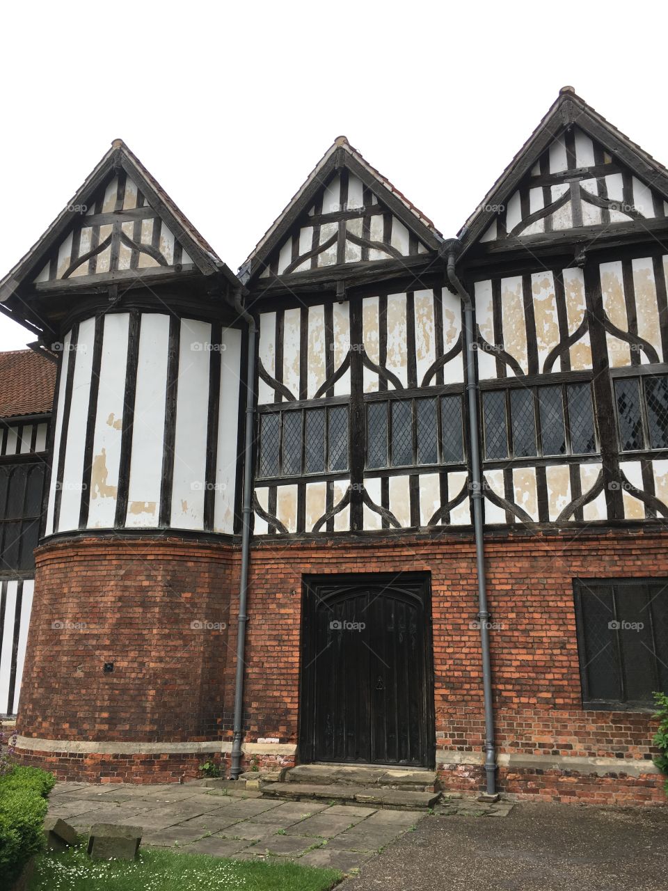 Exterior view of the timber framing and brickwork of the medieval Manor House at Gainsborough Old Hall