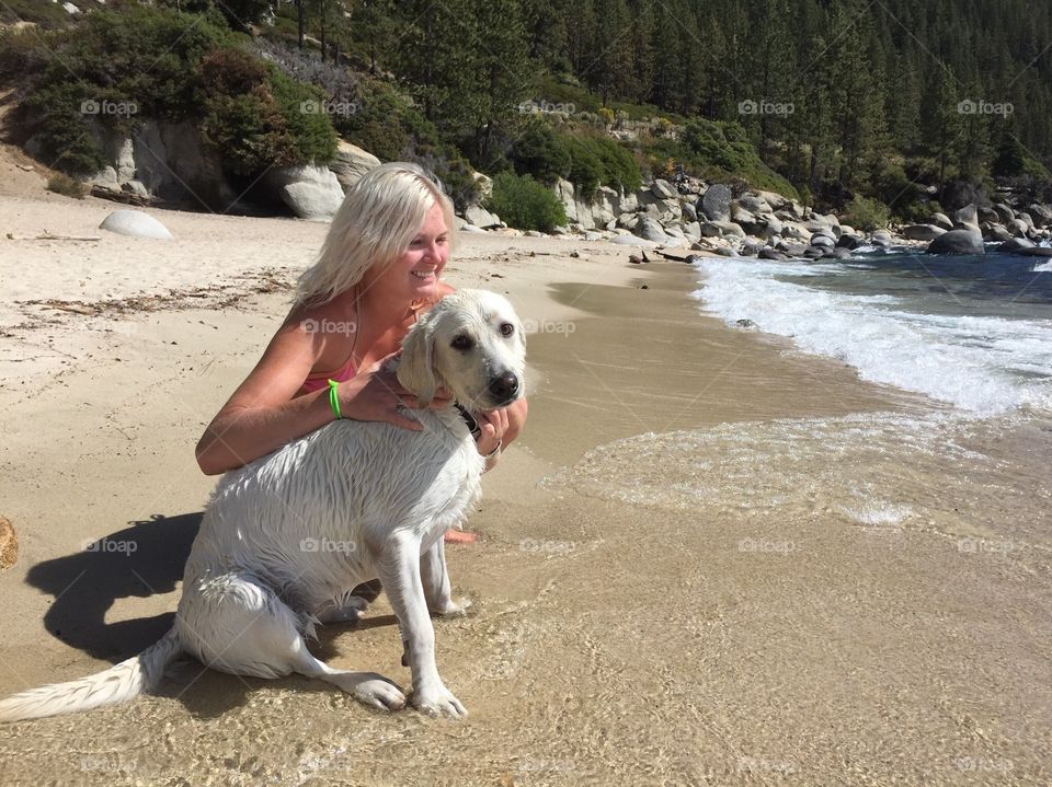 Happy puppy owner at Lake Tahoe