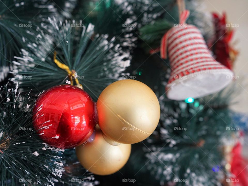 To add to its beauty, Christmas trees are often decorated with various ornaments.