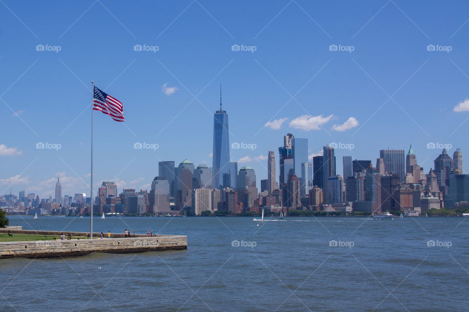 Manhattan Skyline with Ellis Island