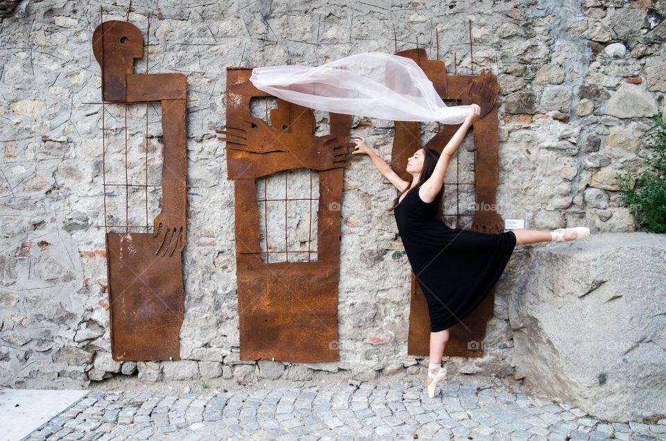 Young Female Ballerina Dancing with a Scarf Outside