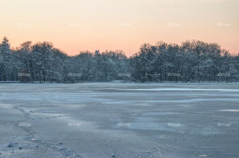 Frozen lake and sunset 