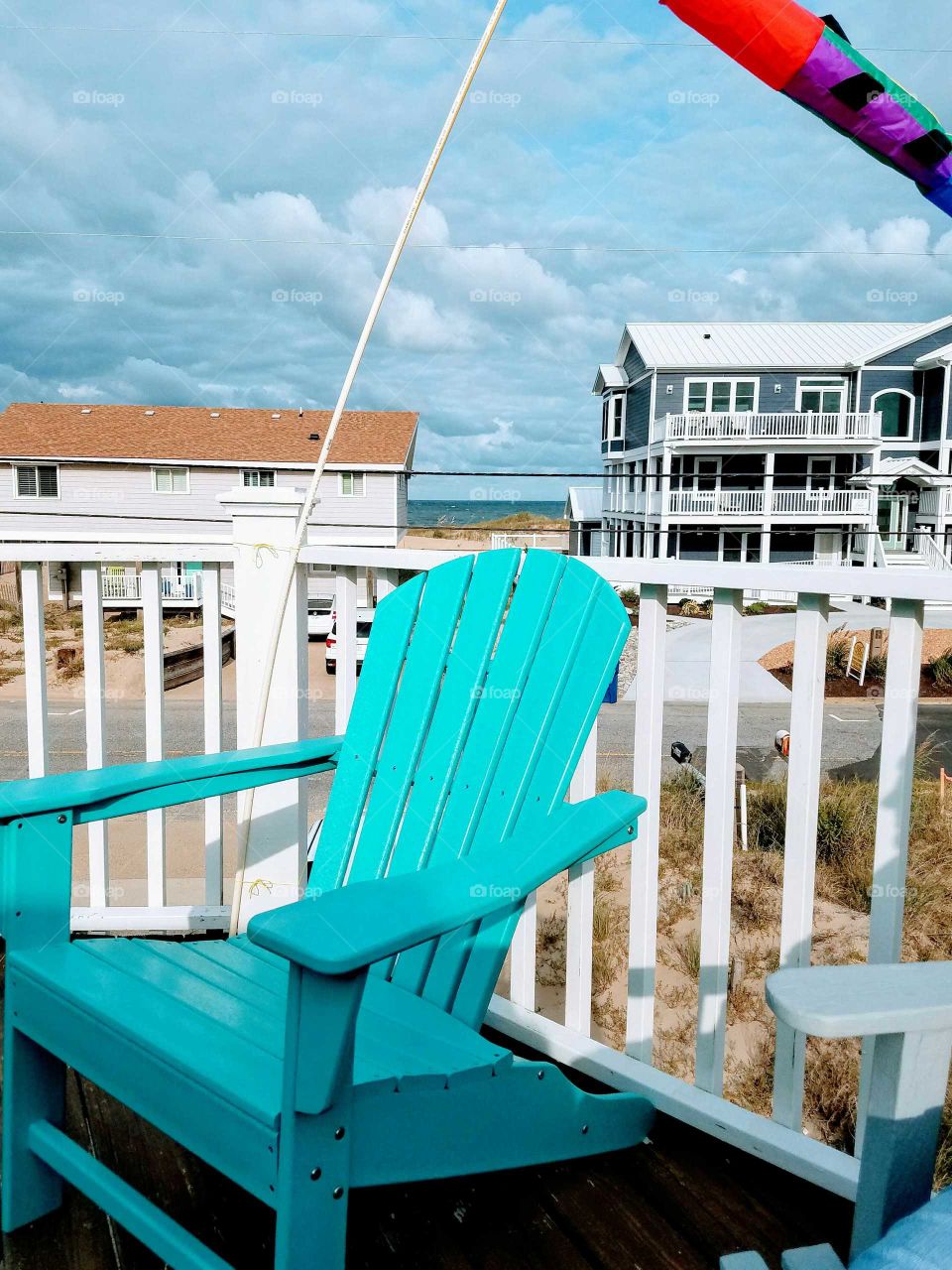 Upper Deck at the Beach House. Overlooking the Ocean.  Admire the Beach Houses...