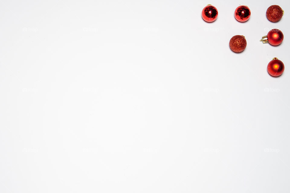 Christmas frame with red decoration in corner