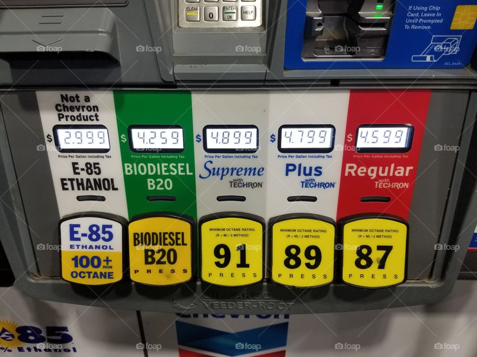Chevron fuel pump showing prices and fuel type.