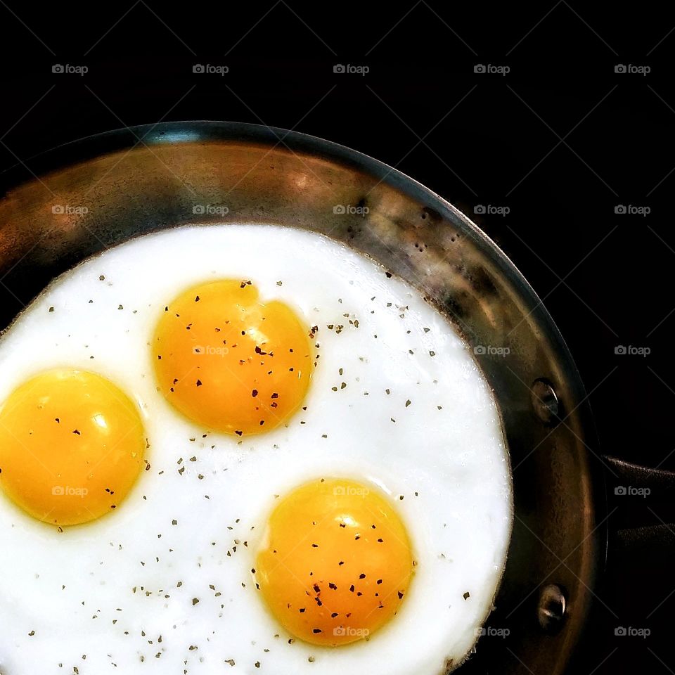 Sunnyside Up Fried Eggs with Beautiful Yellow Yolks