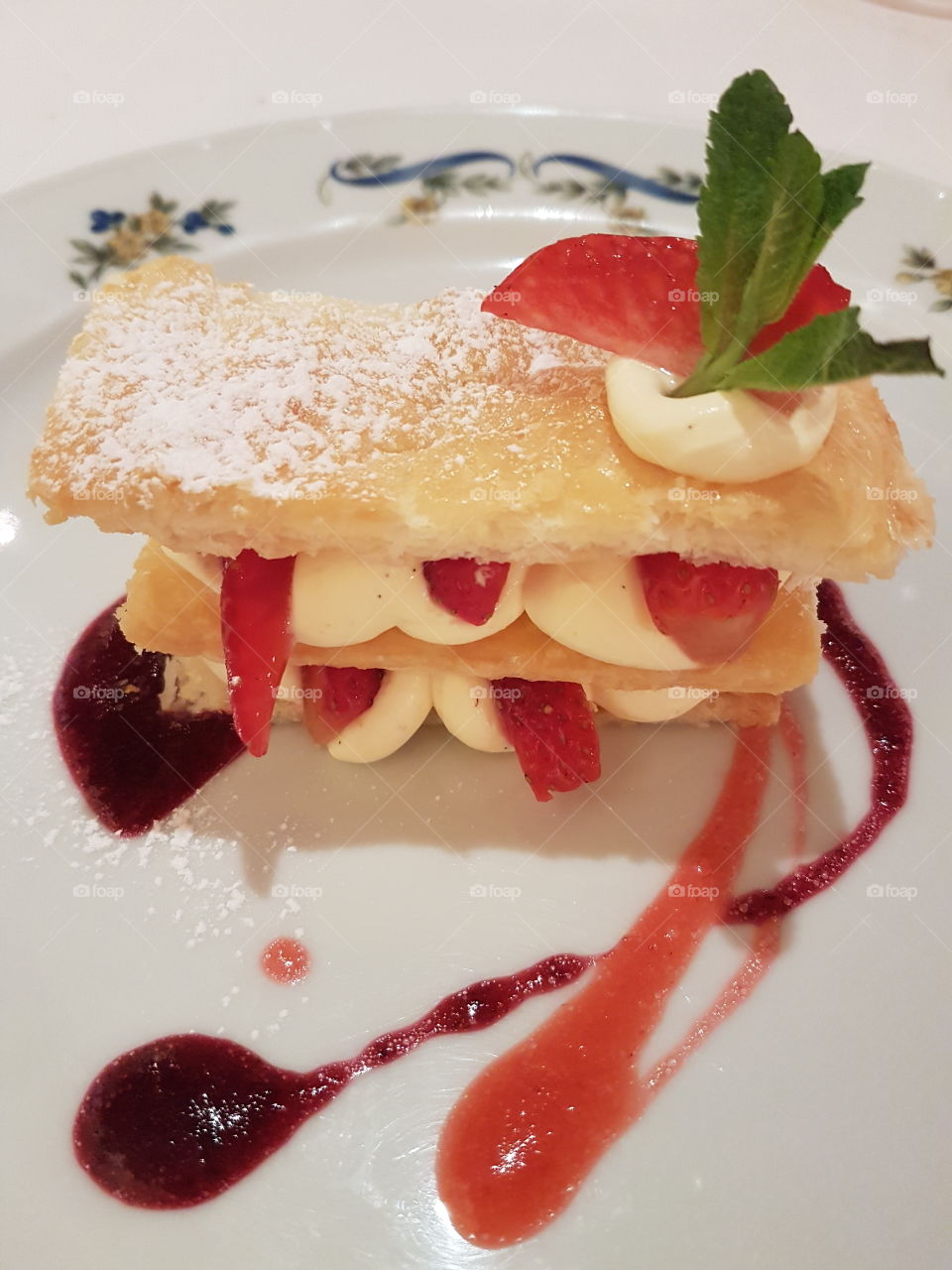 Delicious dessert with strawberries and Chantilly cream