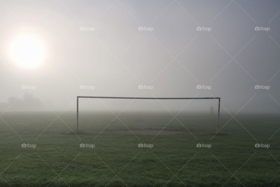 Amateur Football Goalposts. A foggy morning at an amateur football field.  A shot with the goalposts central in the frame.