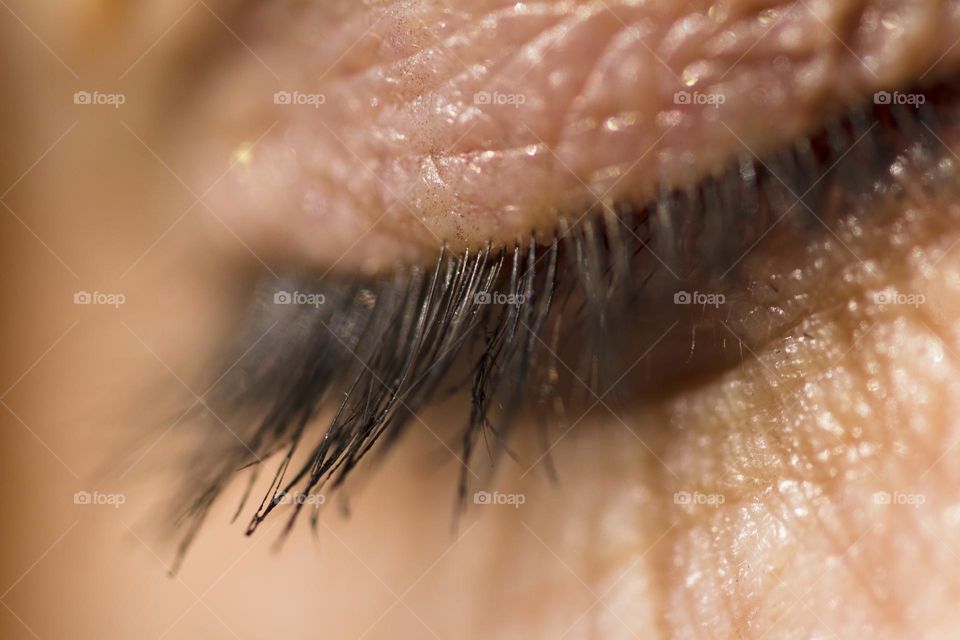 Macro shot of human closed eye
