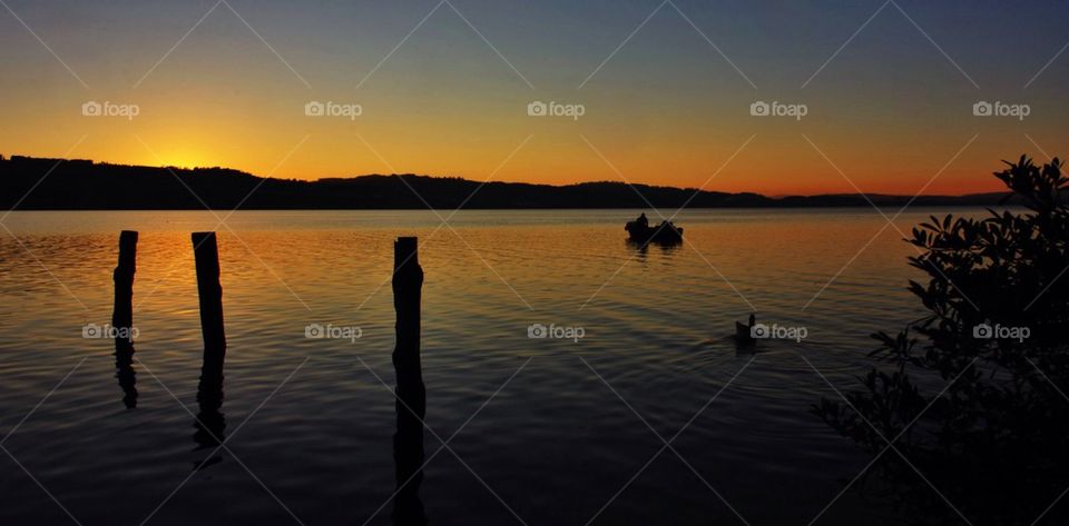 Scenic view of a lake against clear sky