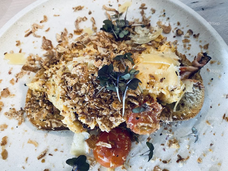 Chilli Scrambled Eggs with crispy onion.