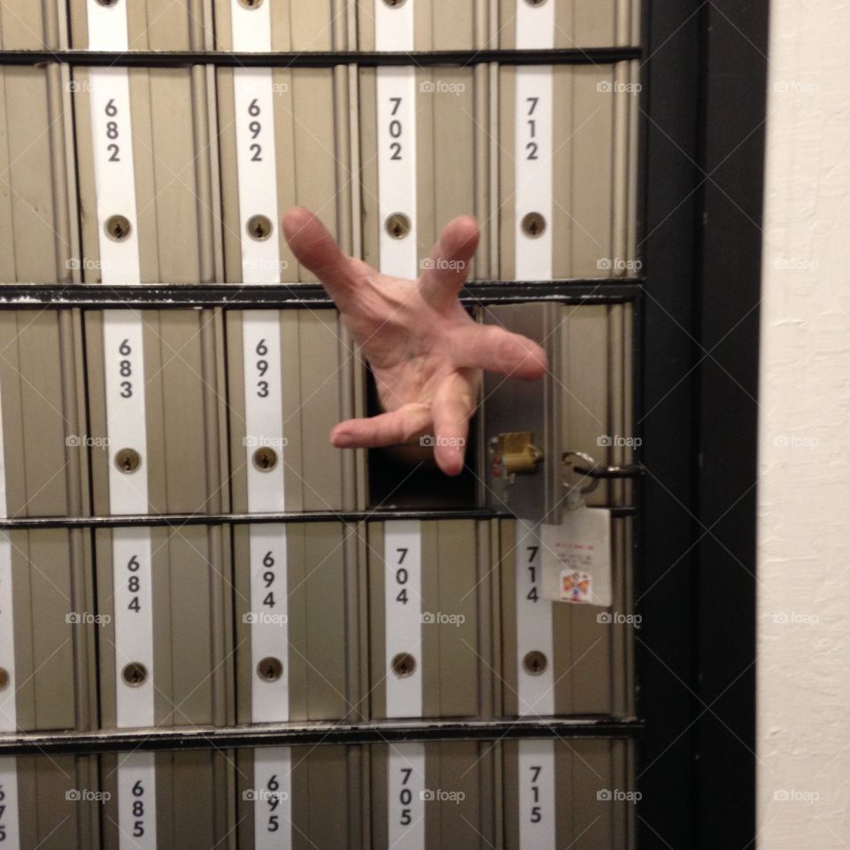 Post office. Reaching for the mail