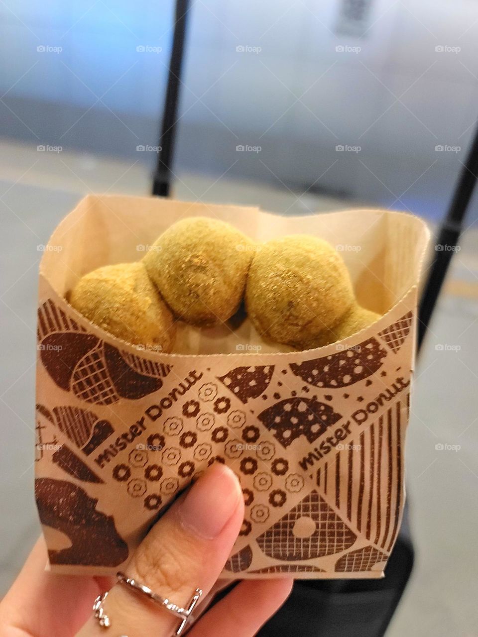 Donuts in paper packaging bag