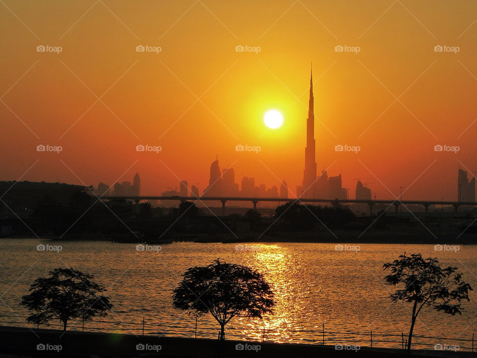 sunset water tower silhouette by chrisc