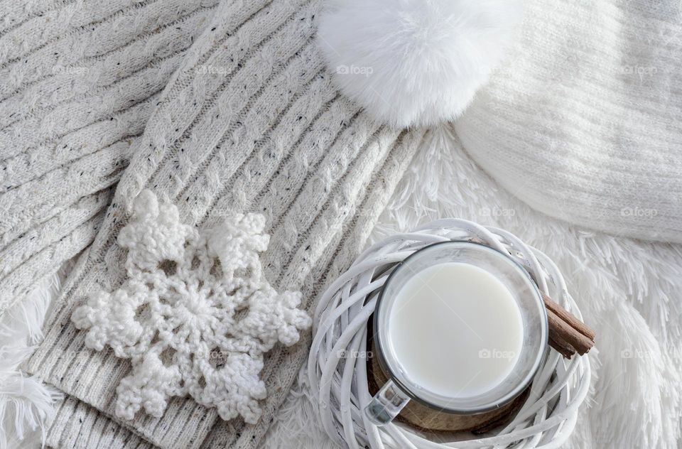 White winter knitwear and warm milk