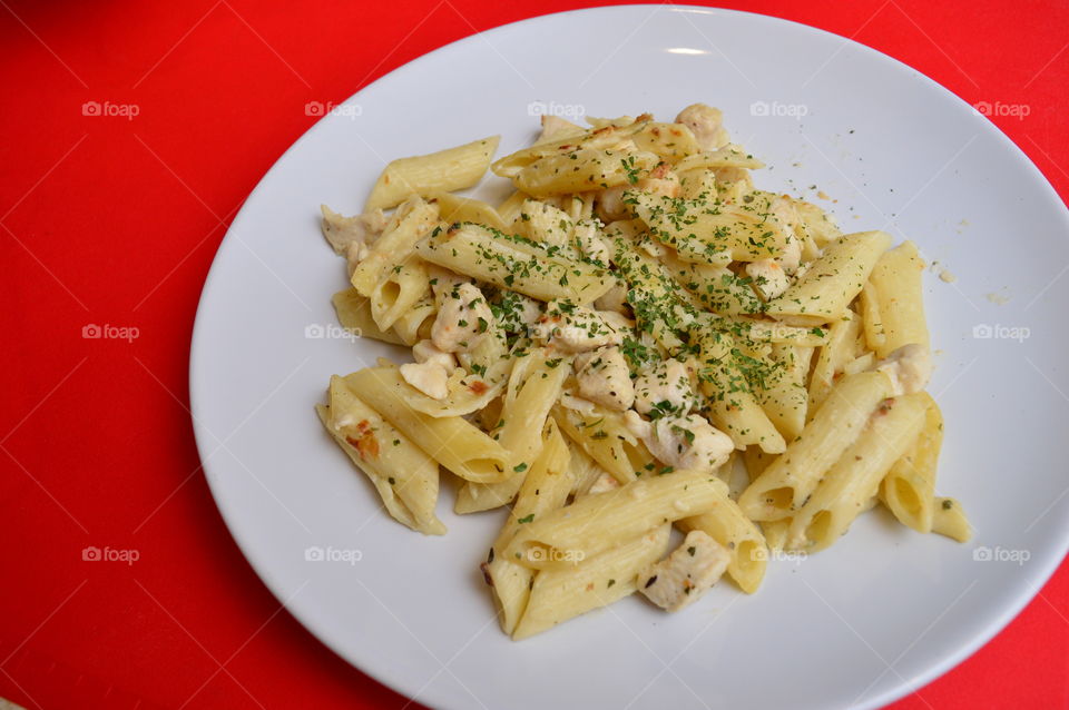 Pasta with chicken on plate