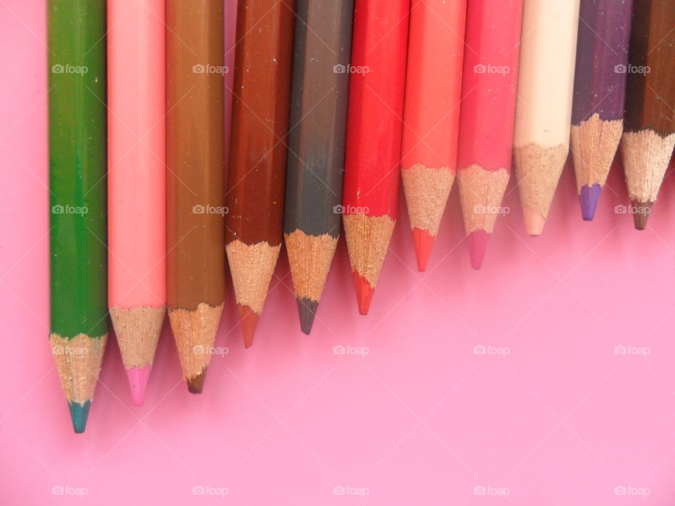 Pastel colored pencil in a row