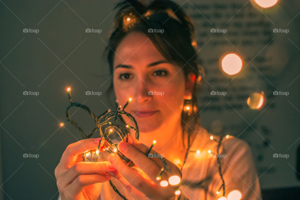 Beautiful girl analysing the lights