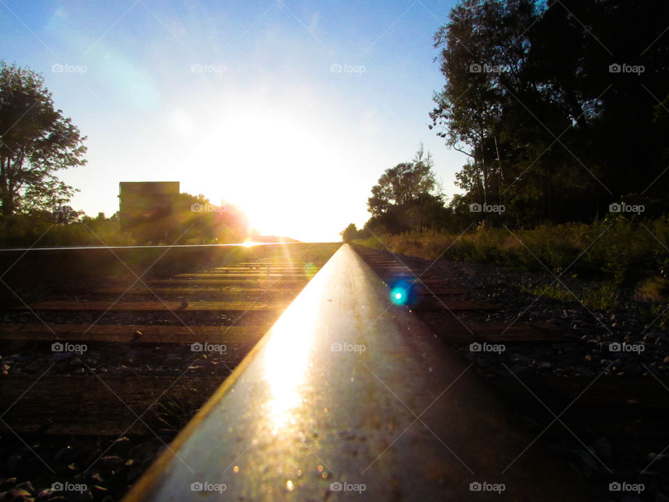 Sun over tracks